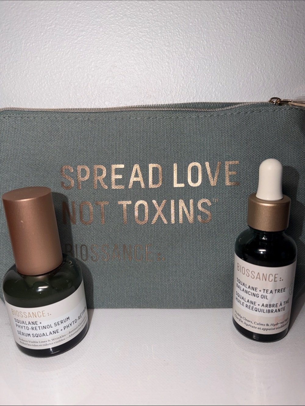 Biossance Green Pouch and two full size bottles
